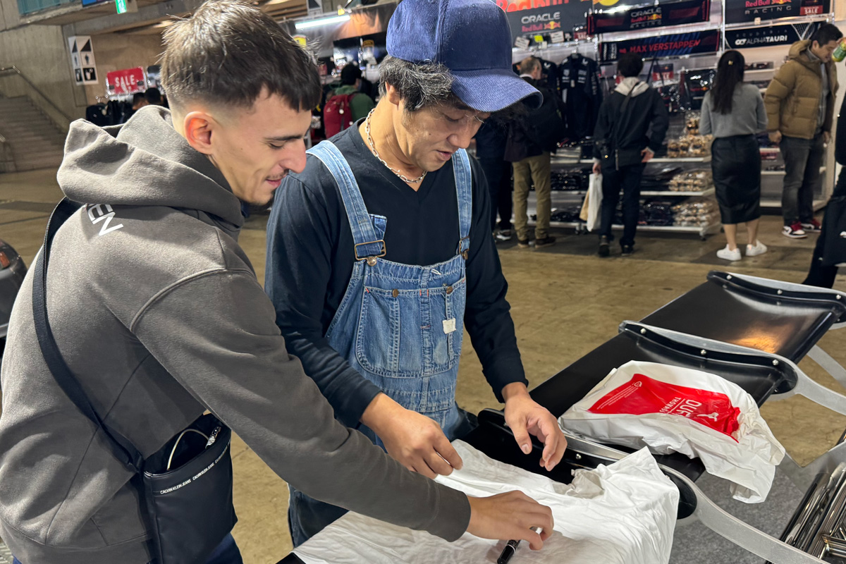 Kei Miura-san signing the official TORQEN Rocket Bunny shirt – Kyoto, Japan